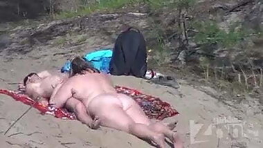 HOT BBW Wife strokes cock on the Beach