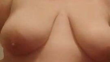 Big girl plays with her massive tits