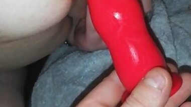 with my girlfriend playing with a dildo