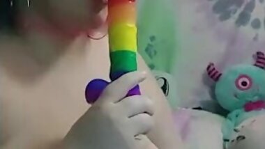 Topless BBW cam girl gives her dildo a blowjob