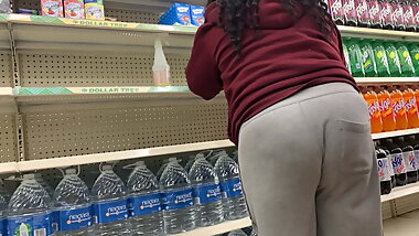 Black granny bending over, showing sexy deep wedgie booty
