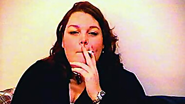 Chubby mature chick smokes on camera