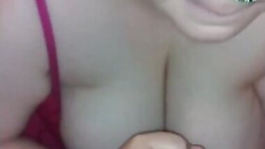 Redhead BBW jerks cum all over her 46DD Tits