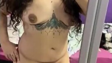 call girl showing herself in front of the mirror