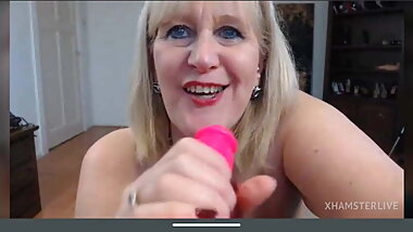 Blonde granny Catherine with saggy tits sucks dildo