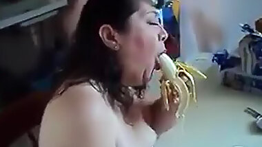 Big girl eats banana naughty style