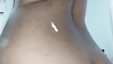 This slutty ebony Mommy spreads cream on her fat ass !!!