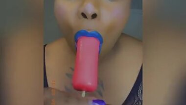 Beautiful Black Chub sucking on a dildo Candy Dick with lipstick