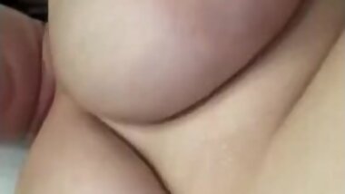 Curvy girl are playing with her huge tits in a tube