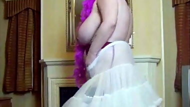 Mature big boobs Sally with feather boa
