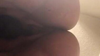 Masturbating her juicy pussy