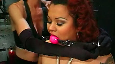 Curvy girl submits to dungeon bondage