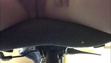 Office Slut plays with herself under desk while watching porn.  I got too loud and almost got caught