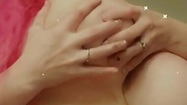 Solo pinky powers playing with huge fake tits and nipples