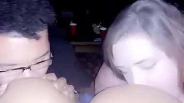 Guy and Girl sucking her titties at the same time