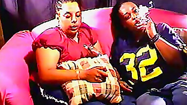 Chubby black chicks smoke on the couch