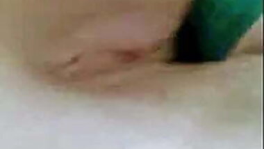 Gena dildoing herself