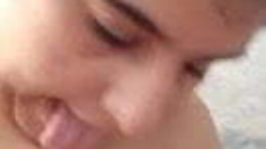 Desi slut sucking her big saggy boobs