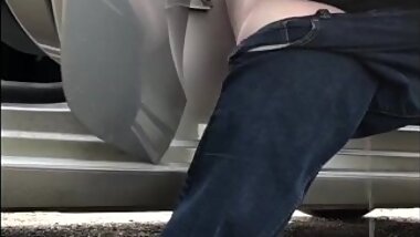 Wife pissing at roadside