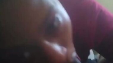 Sexy Ebony BBW Stares Down Camera While Giving BlowJob