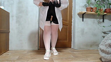 Russian beauty masturbates with a bottle of champagne